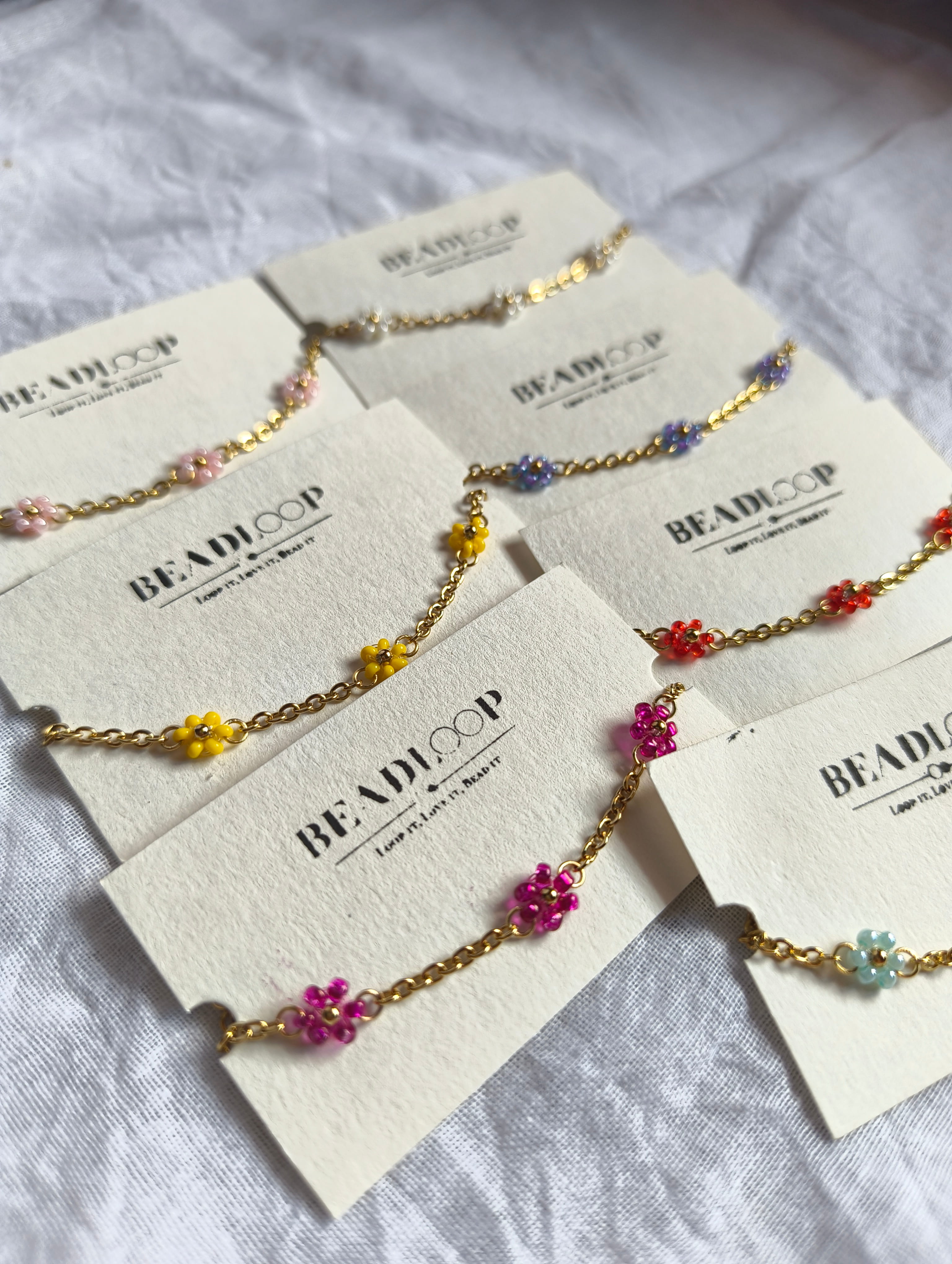 The Dainty Daisy Chain Bracelet (set of 7 different colours)