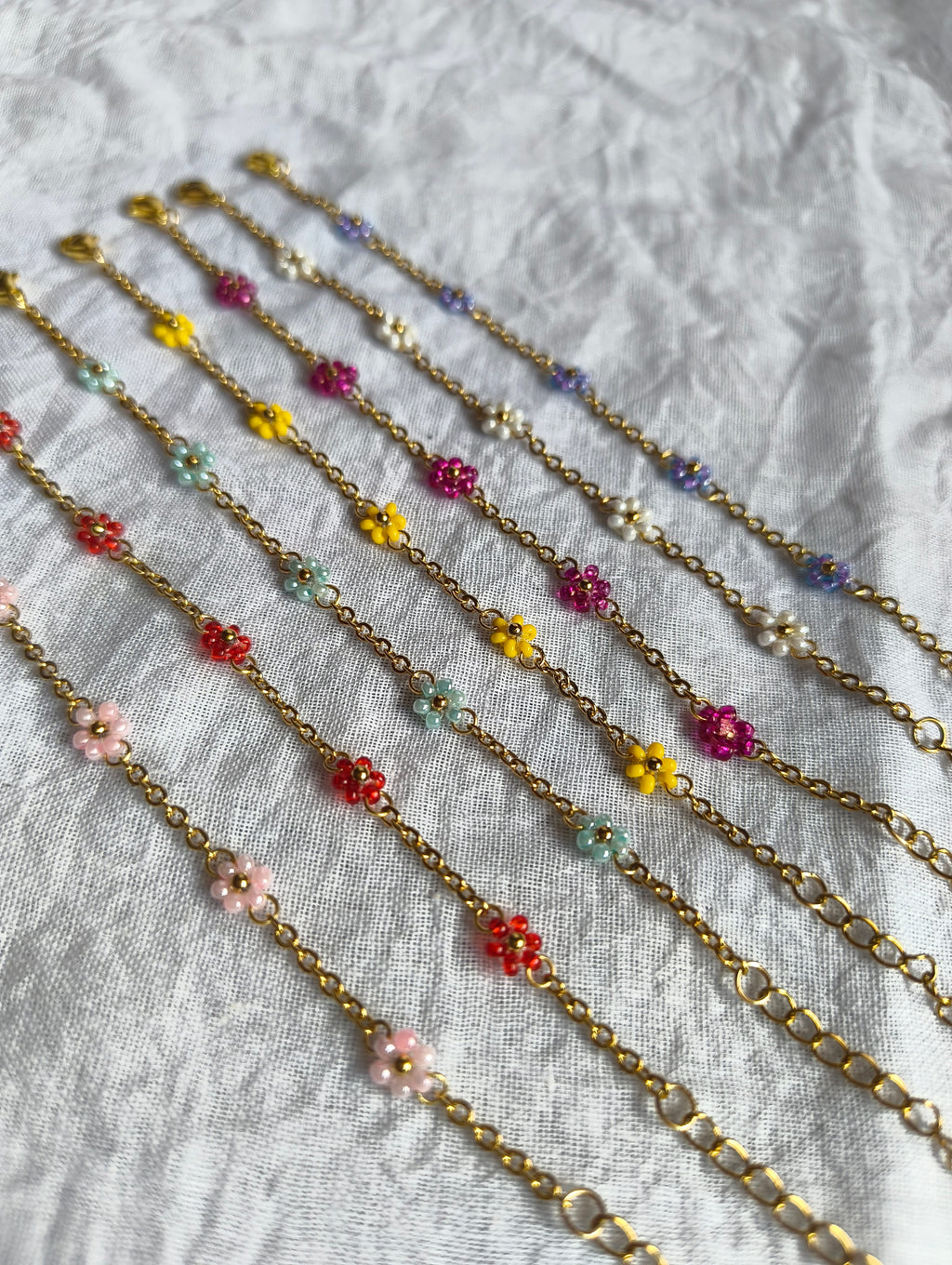 The Dainty Daisy Chain Bracelet (set of 7 different colours)