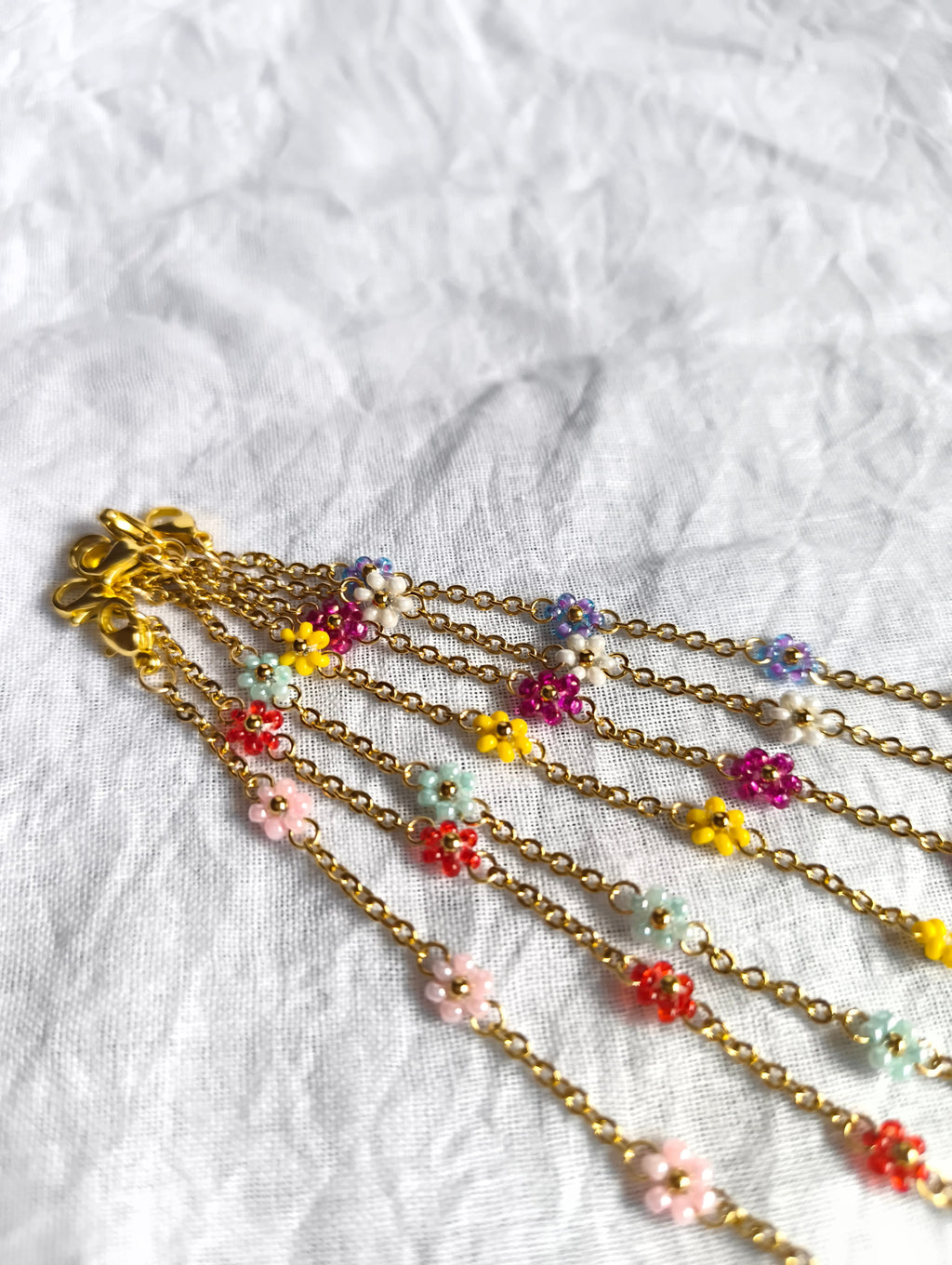 The Dainty Daisy Chain Bracelet (set of 7 different colours)